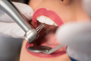 Close-up of dental tools on a sterile tray used for clinical precision